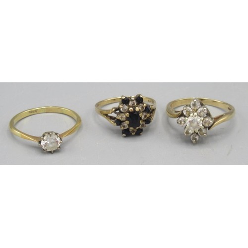 612 - 18ct gold ring set with single clear stone, stamped 18ct, size Q, 2.40g, a 9ct yellow gold sapphire ... 