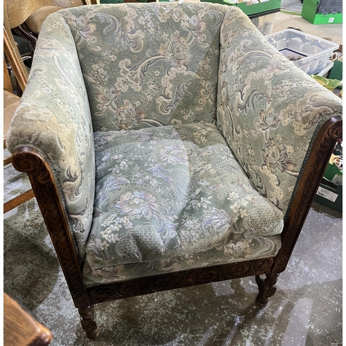 747 - 20th century arm chair, oak frame carved with foliage and scrolls, on turned supports with barley tw... 