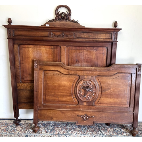 253 - French walnut bedstead, panelled headboard with laurel leaf cresting and acorn cresting, foot with c... 