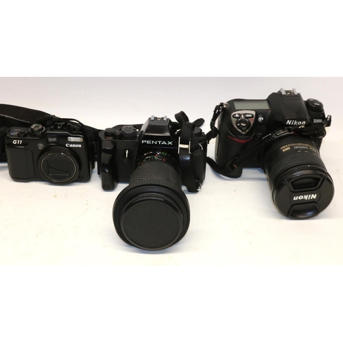 262 - Collection of cameras and photography equipment incl. a Nikon D200 camera body with 18-200mm DX lens... 