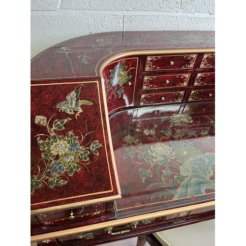 621 - Modern Chinese red lacquered glass topped Carlton House desk and matching chair, painted with chrysa... 