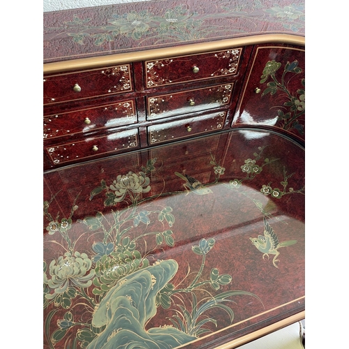 621 - Modern Chinese red lacquered glass topped Carlton House desk and matching chair, painted with chrysa... 