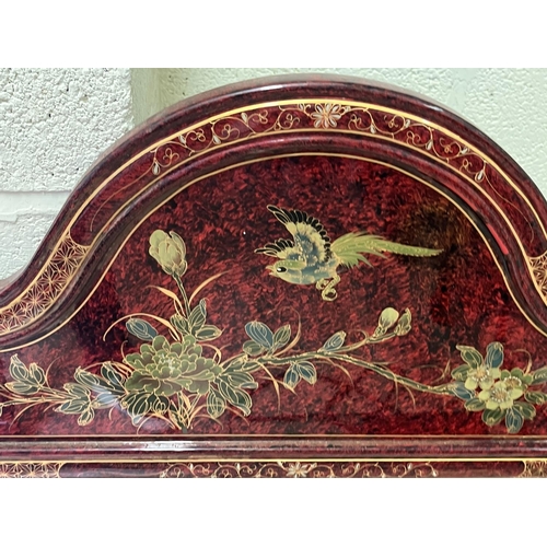 622 - Modern Chinese red lacquered mirror, painted with birds and blossom, L91cm H76cm