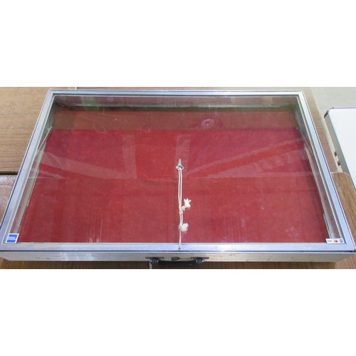 315 - Three portable velvet-lined aluminium display cabinets with plastic frontage 87 x 54cm