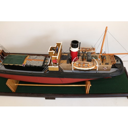 593 - Large radio controlled freighter model ship 'Talacre', fibreglass hull, wooden carry cradle, in glas... 