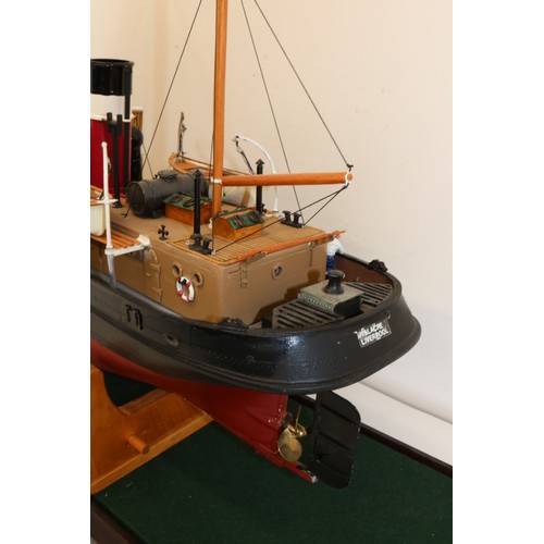 593 - Large radio controlled freighter model ship 'Talacre', fibreglass hull, wooden carry cradle, in glas... 