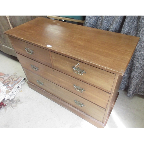 753 - Edwardian walnut chest of two short and two long drawers with brass handles, on skited base, W108 D4... 