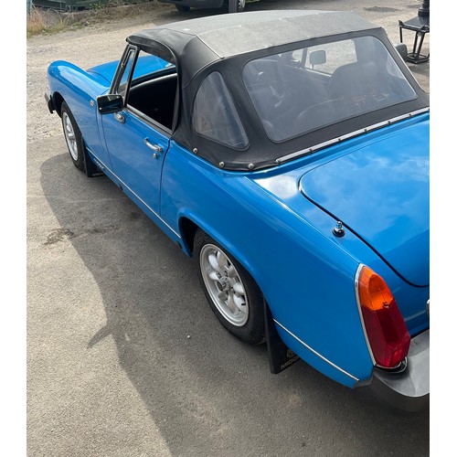 880 - Convertible Soft Top MG Midget in Sky Blue Finish. Fully restored to immaculate condition (spent mos... 