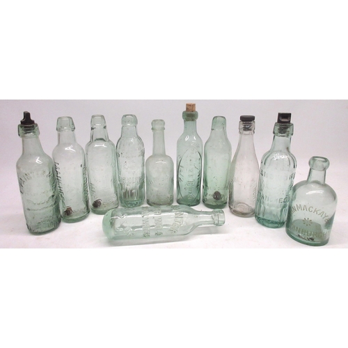 913 - Eleven early 20th century glass bottles of various designs and eras, including Snowdrop, E. Painter ... 