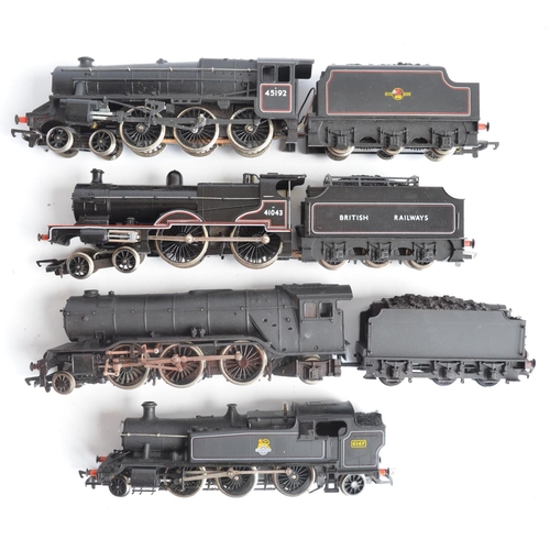 16 - Seven boxed OO gauge electric steam train models (various manufacturers), all BR black liveried to i... 