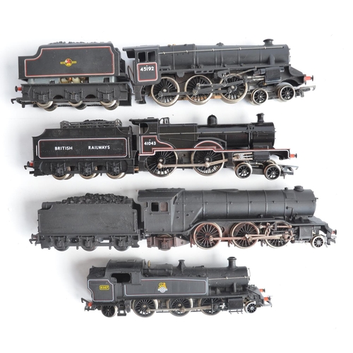 16 - Seven boxed OO gauge electric steam train models (various manufacturers), all BR black liveried to i... 