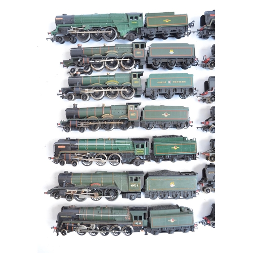 21 - Fourteen previously run OO gauge electric steam train models, various manufacturers to include Bachm... 