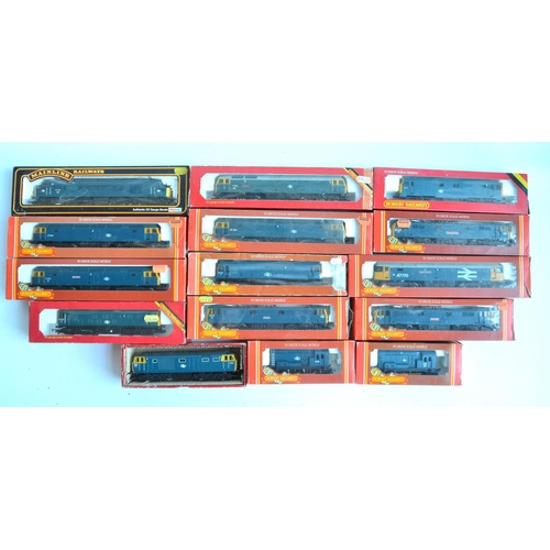 22 - Fifteen previously run boxed OO gauge electric diesel locomotive train models from Hornby and Mainli... 