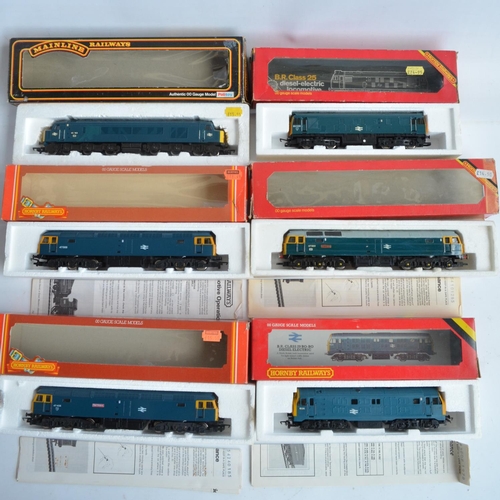 22 - Fifteen previously run boxed OO gauge electric diesel locomotive train models from Hornby and Mainli... 