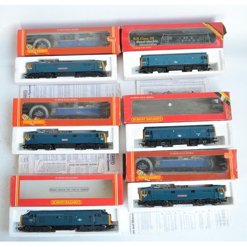 24 - Twelve previously run boxed OO gauge electric diesel locomotive train models (3x Class 25, 2x Class ... 