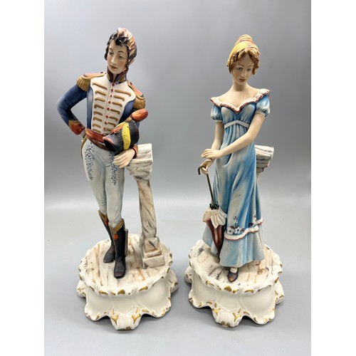 586 - Capodimonte figures: 'The Queen's Silver Jubilee', Queen Elizabeth II with two corgis, on wooden pli... 