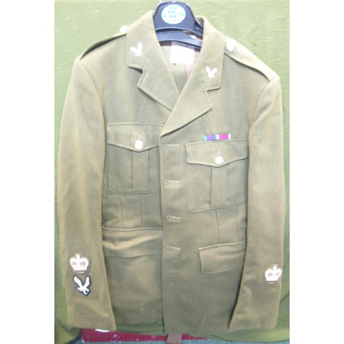 299 - Large collection of military uniforms. Royal Navy, Army  shirts, putties, berets, No1 uniform with C... 