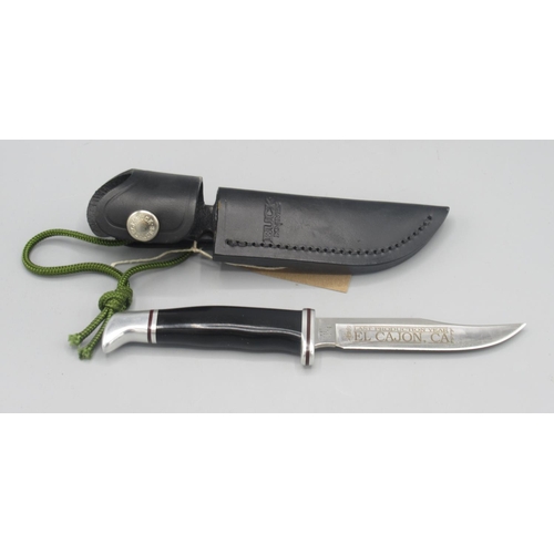 379 - Buck 102 Woodsman 'last production year' edition sheath knife, in excellent condition complete with ... 