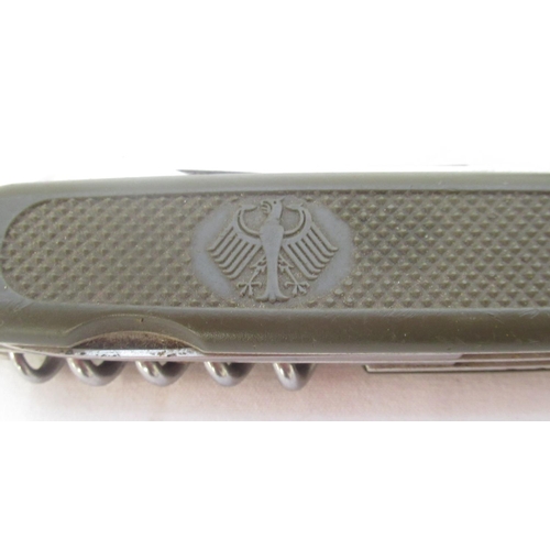 392 - Victorinox German Army issue pocket knife, blade L3.4''. Also with stainless steel pocket knife