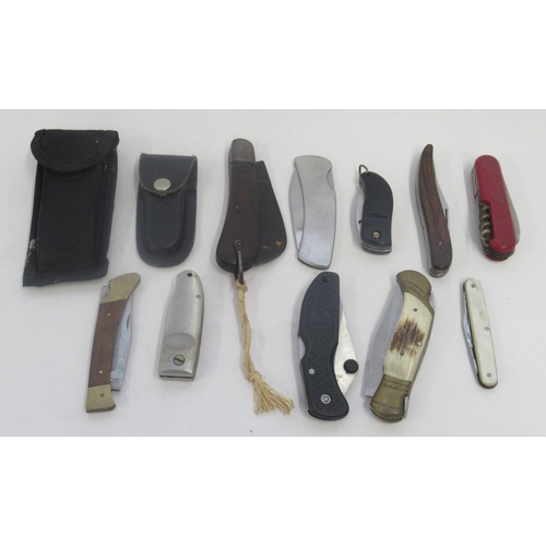 396 - Large collection of folding pocket knives of various styles and eras. Including a vintage pruning kn... 