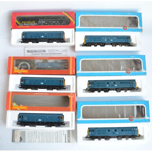 25 - Twelve previously run boxed OO gauge electric diesel locomotive train models (3x Class 31, 3x Class ... 