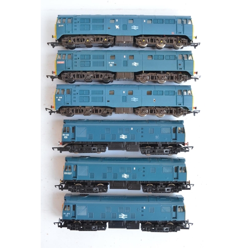 25 - Twelve previously run boxed OO gauge electric diesel locomotive train models (3x Class 31, 3x Class ... 