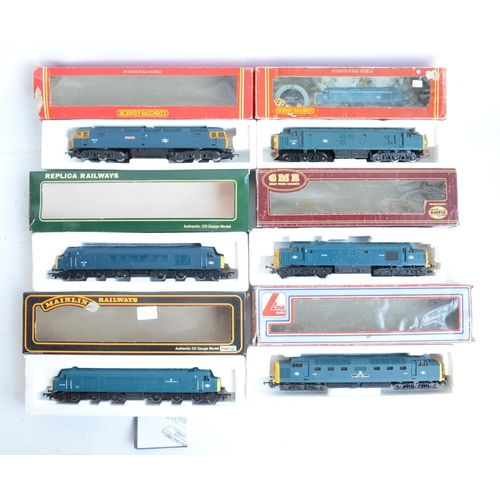 25 - Twelve previously run boxed OO gauge electric diesel locomotive train models (3x Class 31, 3x Class ... 