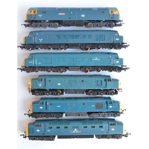 25 - Twelve previously run boxed OO gauge electric diesel locomotive train models (3x Class 31, 3x Class ... 