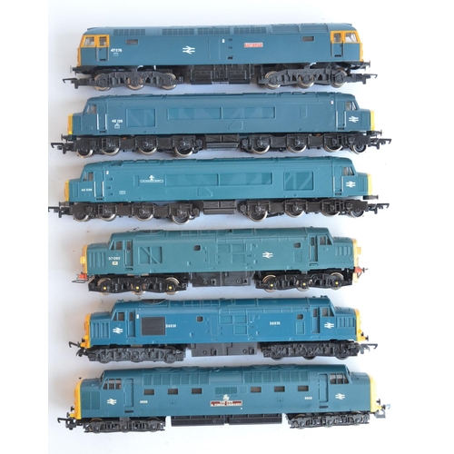 25 - Twelve previously run boxed OO gauge electric diesel locomotive train models (3x Class 31, 3x Class ... 