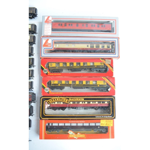 37 - Collection of previously used mostly OO gauge locomotives and passenger wagons including 6 boxed coa... 