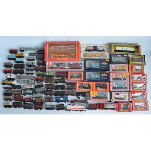 38 - Extensive collection of previously run mostly OO gauge railway goods wagons and rolling stock to inc... 