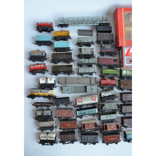 38 - Extensive collection of previously run mostly OO gauge railway goods wagons and rolling stock to inc... 