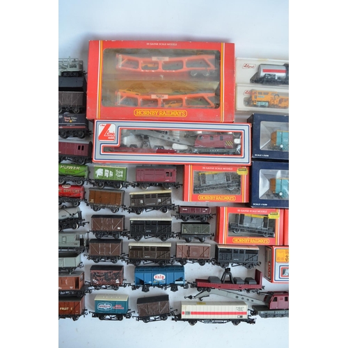 38 - Extensive collection of previously run mostly OO gauge railway goods wagons and rolling stock to inc... 