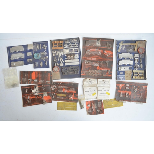 53 - Collection of unbuilt and partially built white metal and brass locomotive models and parts includin... 