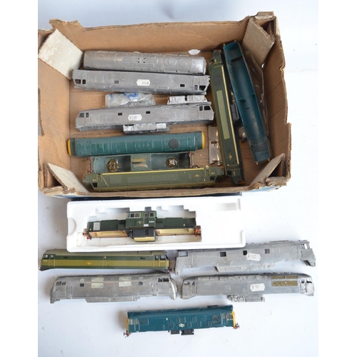 56 - Collection of unbuilt and partially built OO gauge white metal and brass diesel locomotive and passe... 