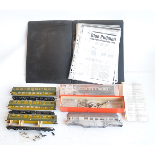 56 - Collection of unbuilt and partially built OO gauge white metal and brass diesel locomotive and passe... 