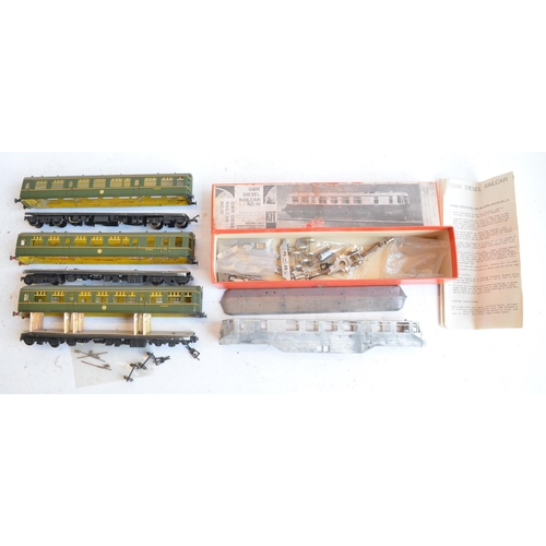 56 - Collection of unbuilt and partially built OO gauge white metal and brass diesel locomotive and passe... 