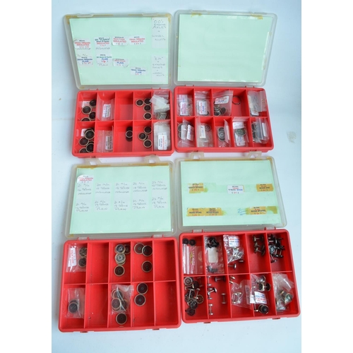 57 - Extensive collection of spare OO gauge railway model kit parts and spares to include wheels, PE deta... 