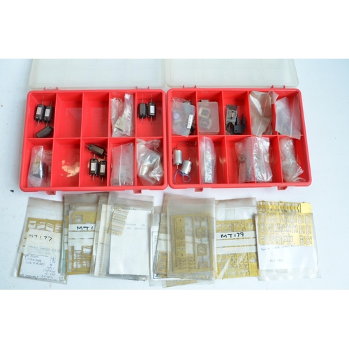 57 - Extensive collection of spare OO gauge railway model kit parts and spares to include wheels, PE deta... 