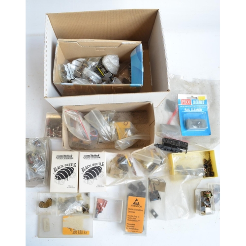 58 - Extensive collection of spare OO gauge railway model kit parts, spares and accessories to include Ga... 