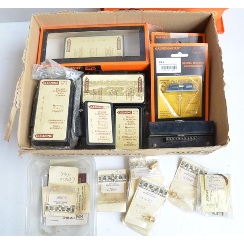 58 - Extensive collection of spare OO gauge railway model kit parts, spares and accessories to include Ga... 