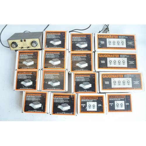 61 - Collection of previously used Gaugemaster track controllers, type T1 and T2 traansformers, large qua... 