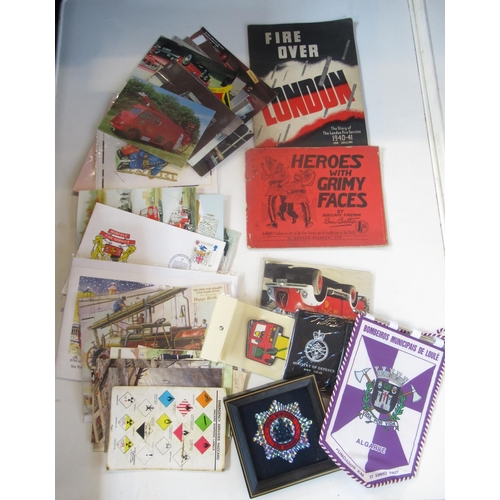 287 - Collection of firefighter themed memorabilia and ephemera, including patches, badges, three Polish m... 