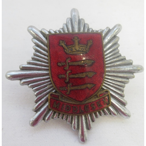 288 - Collection of firefighter badges, largely from the UK, including Middlesex, Cumbria, The Cayman Isla... 