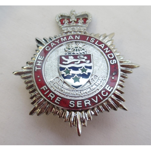 288 - Collection of firefighter badges, largely from the UK, including Middlesex, Cumbria, The Cayman Isla... 