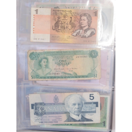 221 - Two folders containing American and other banknotes, to inc. 24 replica Confederate states banknotes... 