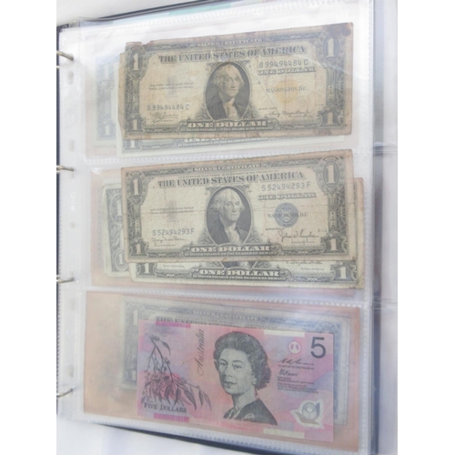 221 - Two folders containing American and other banknotes, to inc. 24 replica Confederate states banknotes... 