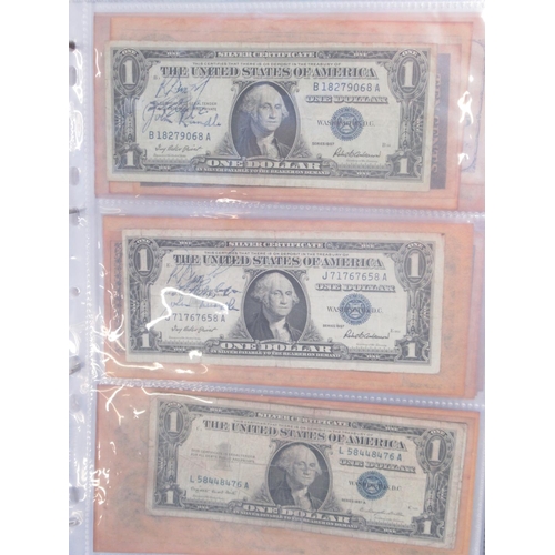 221 - Two folders containing American and other banknotes, to inc. 24 replica Confederate states banknotes... 