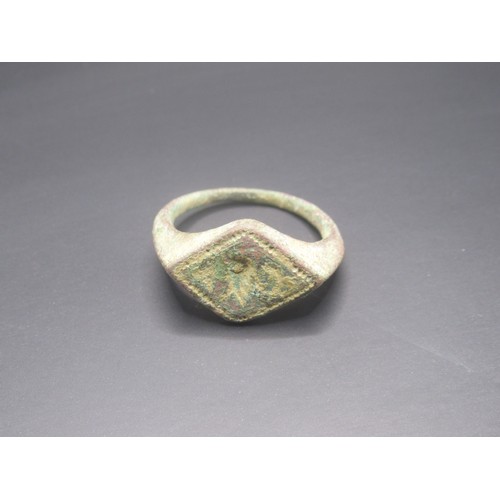 205 - A complete copper-alloy signet type finger ring of Post-Medieval date, c. AD 1400 - 1600. The upper ... 