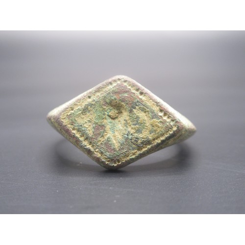 205 - A complete copper-alloy signet type finger ring of Post-Medieval date, c. AD 1400 - 1600. The upper ... 